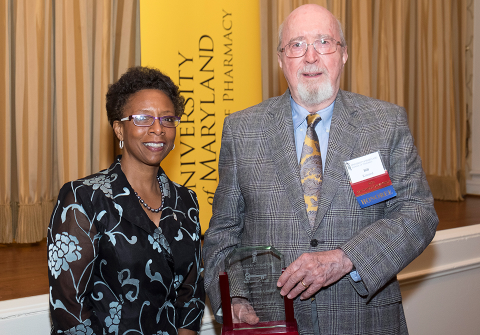 Dean Natalie Eddington Presents Dr. Kinnard with the Key to Pharmacy Hall