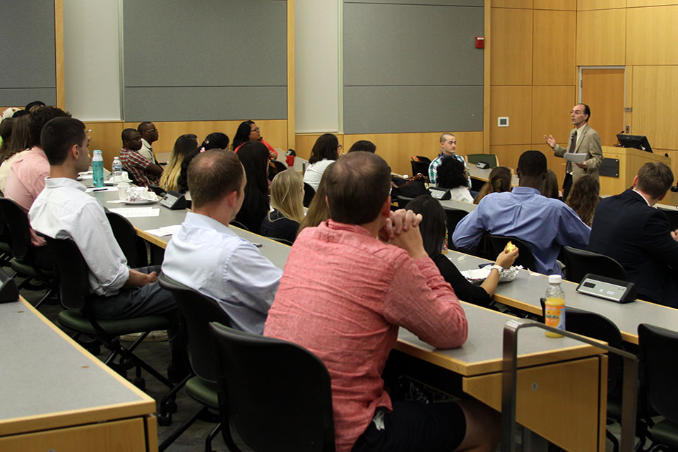 Dr. Andrew Coop Addresses Students