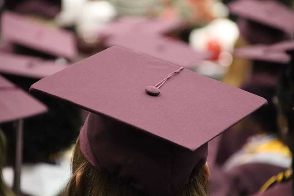 Graduation cap photographed from behind.