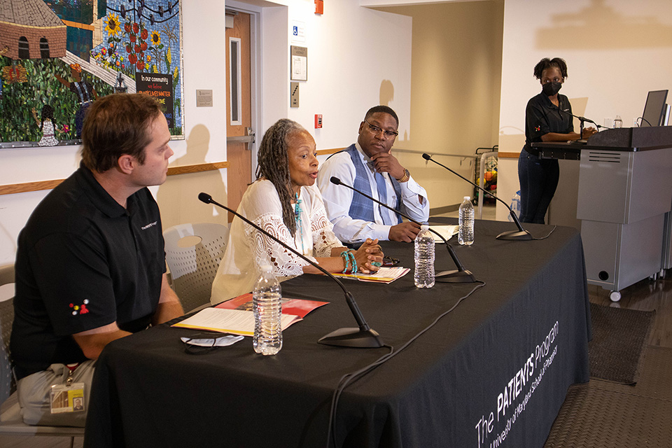 A three-person panel speaks during PATIENTS Day 2022.